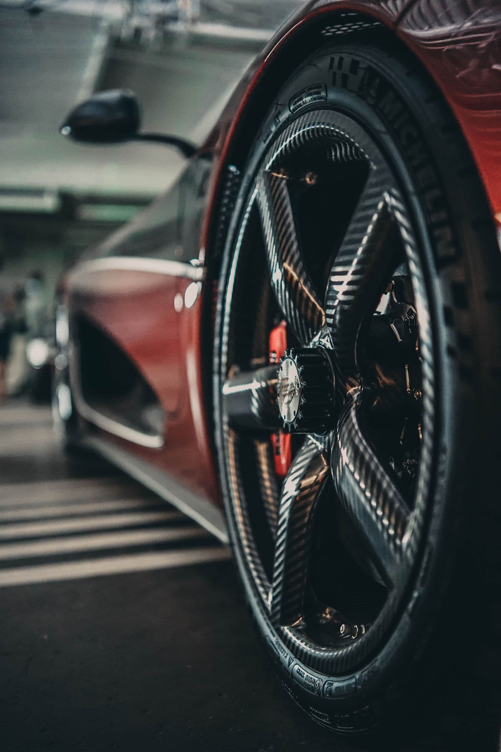 Close-up of a carbon-fibre wheel after detailing